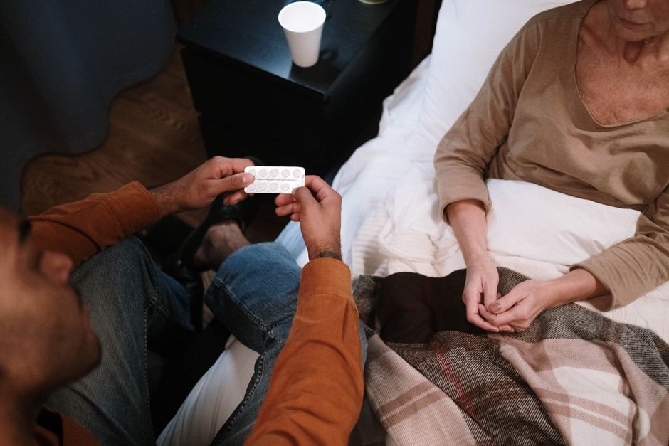Home health nurse providing skilled care to a senior at home